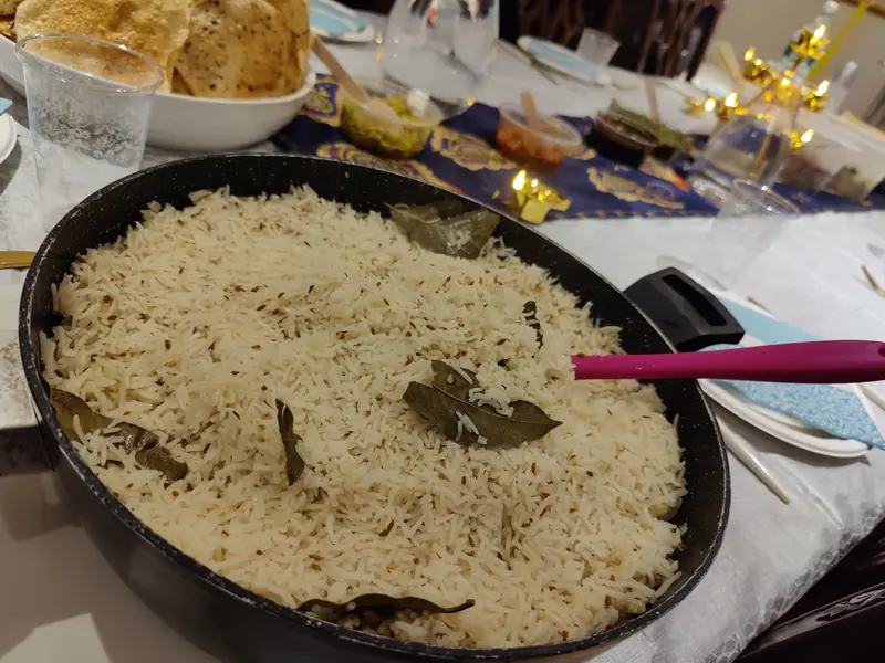 A large pan of spiced rice on the table