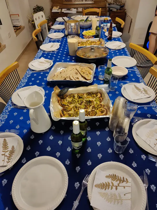 A long table set with the full Indian spread